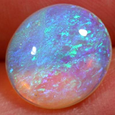 SOLID CRYSTAL OPAL 3D pattern, green over a mauve hue